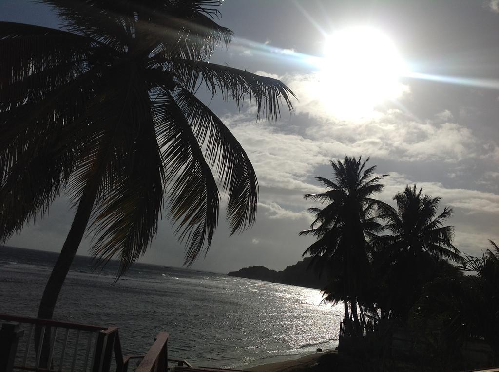 Rainbow Beach Apartments & Rooms Calibishie Ruang foto