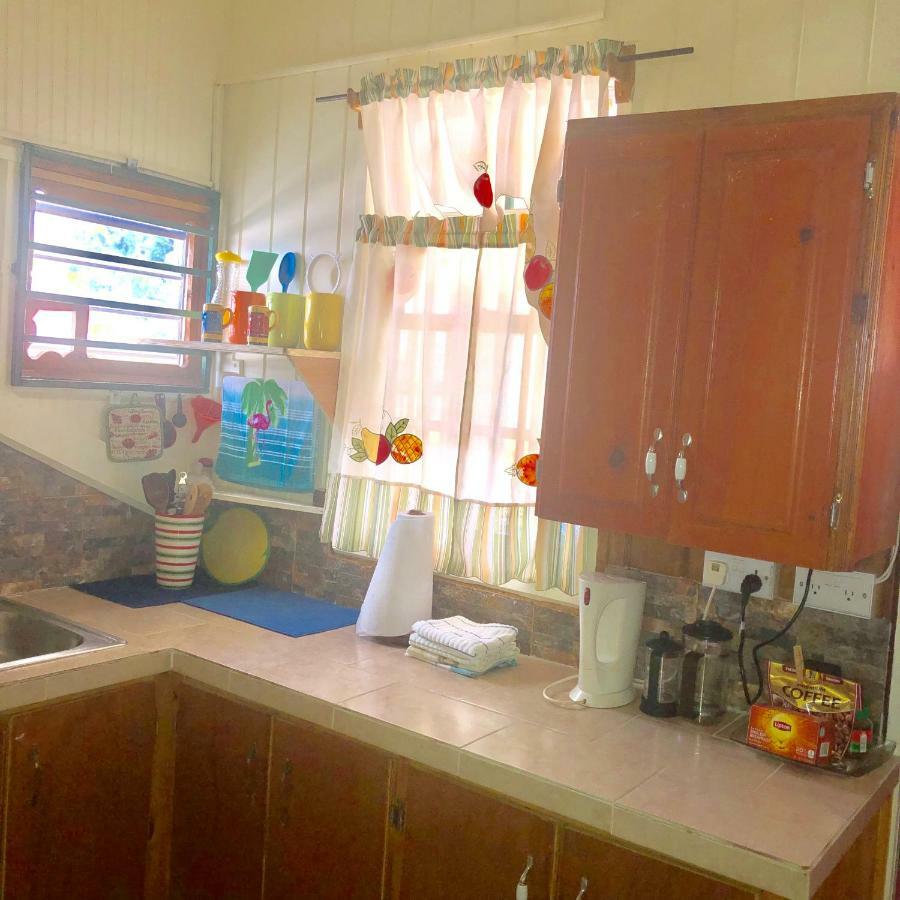 Rainbow Beach Apartments & Rooms Calibishie Bagian luar foto